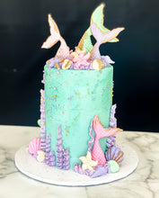 Load image into Gallery viewer, Size: 4&quot; One tier. Icing Exterior: Teal. Accents: pink, purple, gold.

