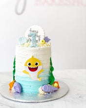 Load image into Gallery viewer, 4&quot; round, white to blue buttercream, with baby shark accents

