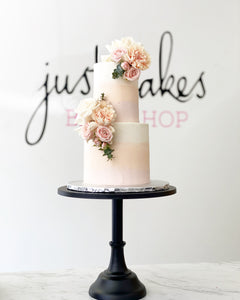 Size: 4-6" Two tier. Icing exterior: ombre white to light peach to light pink.